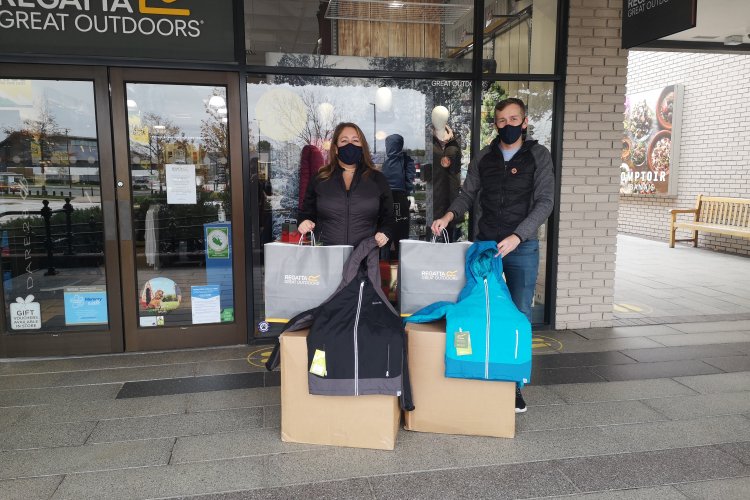 BC Club donates winter jackets to Bournemouth school children